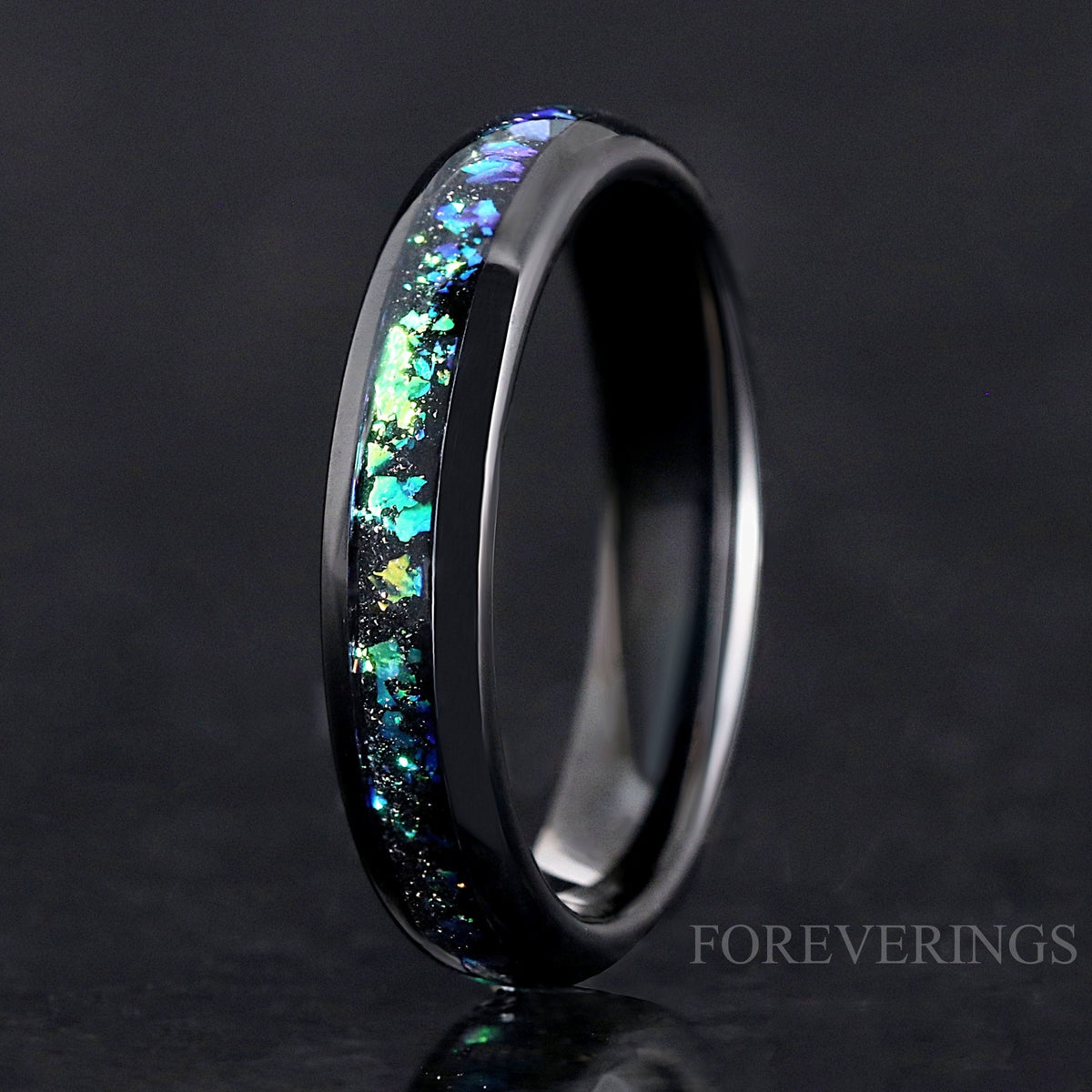 4mm black tungsten ring with Rosette Nebula inlay, standing upright close-up