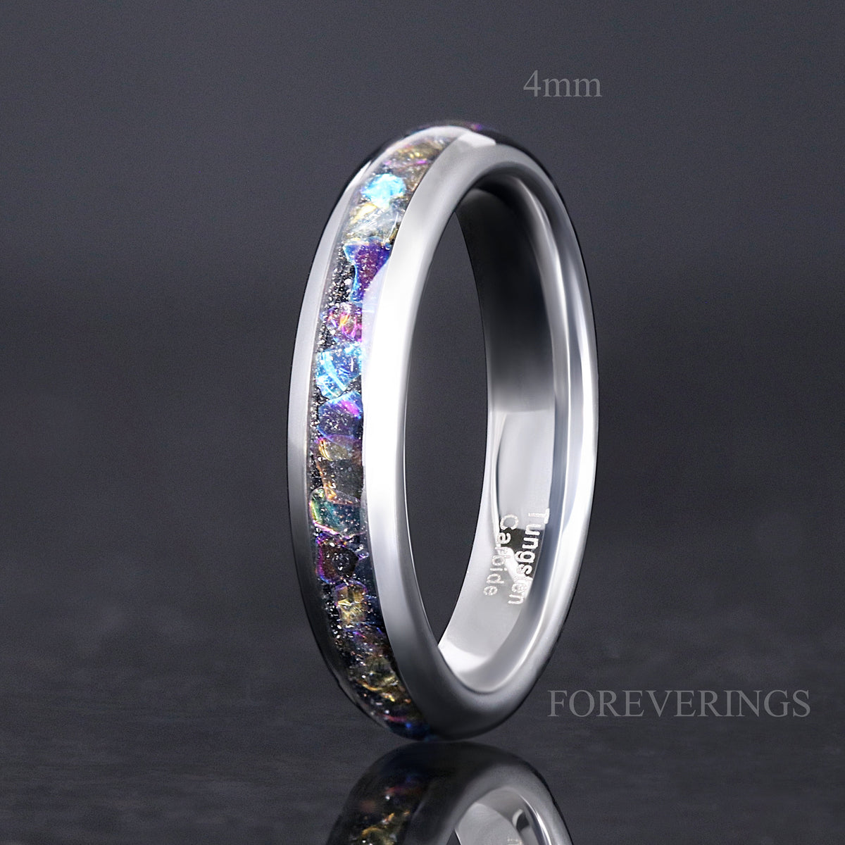 Silver tungsten ring labeled 4mm with moonstone inlay, standing on edge