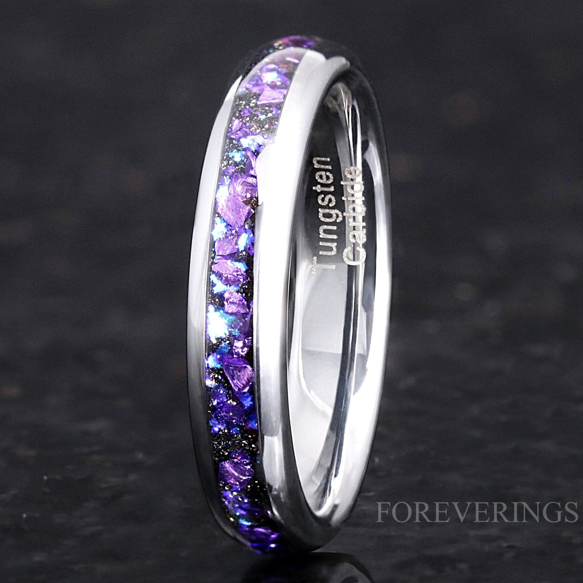 4mm silver tungsten ring with crushed alexandrite inlay, standing, angled to show the interior