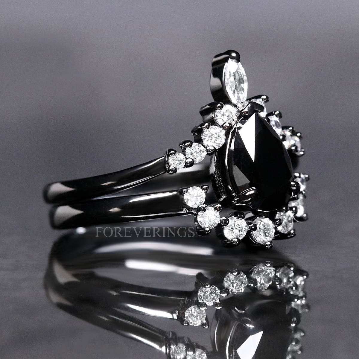 Black onyx engagement ring and curved band in black sterling silver, side view