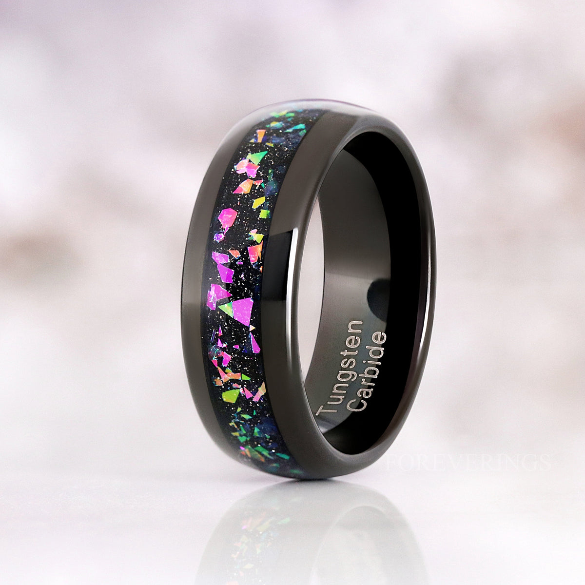 8mm black tungsten supernova ring standing at an angle to show the black interior
