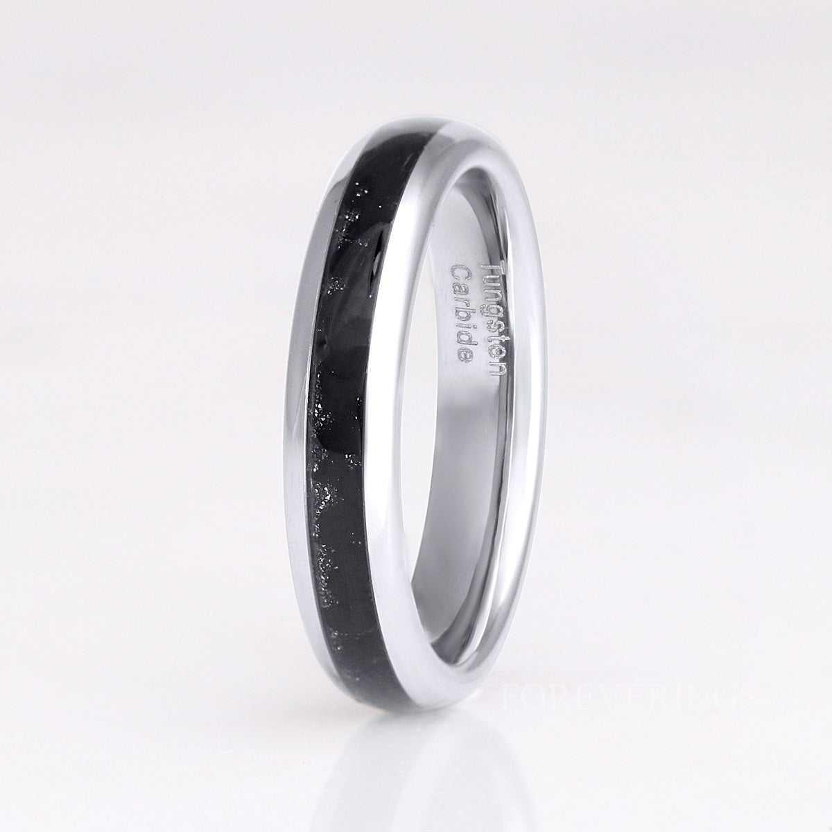 Women's 4mm silver tungsten ring with black onyx inlay, angled to show the inside