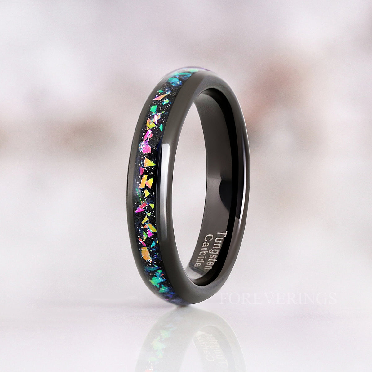 4mm black tungsten supernova ring standing on edge, the narrowest width