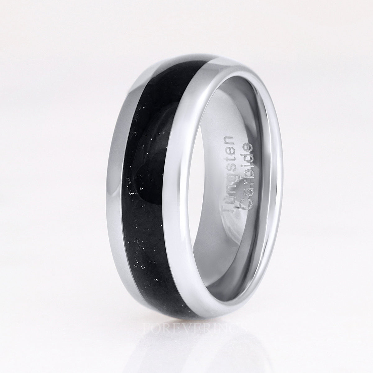 Men's 8mm silver tungsten band with black onyx inlay, angled to show the interior