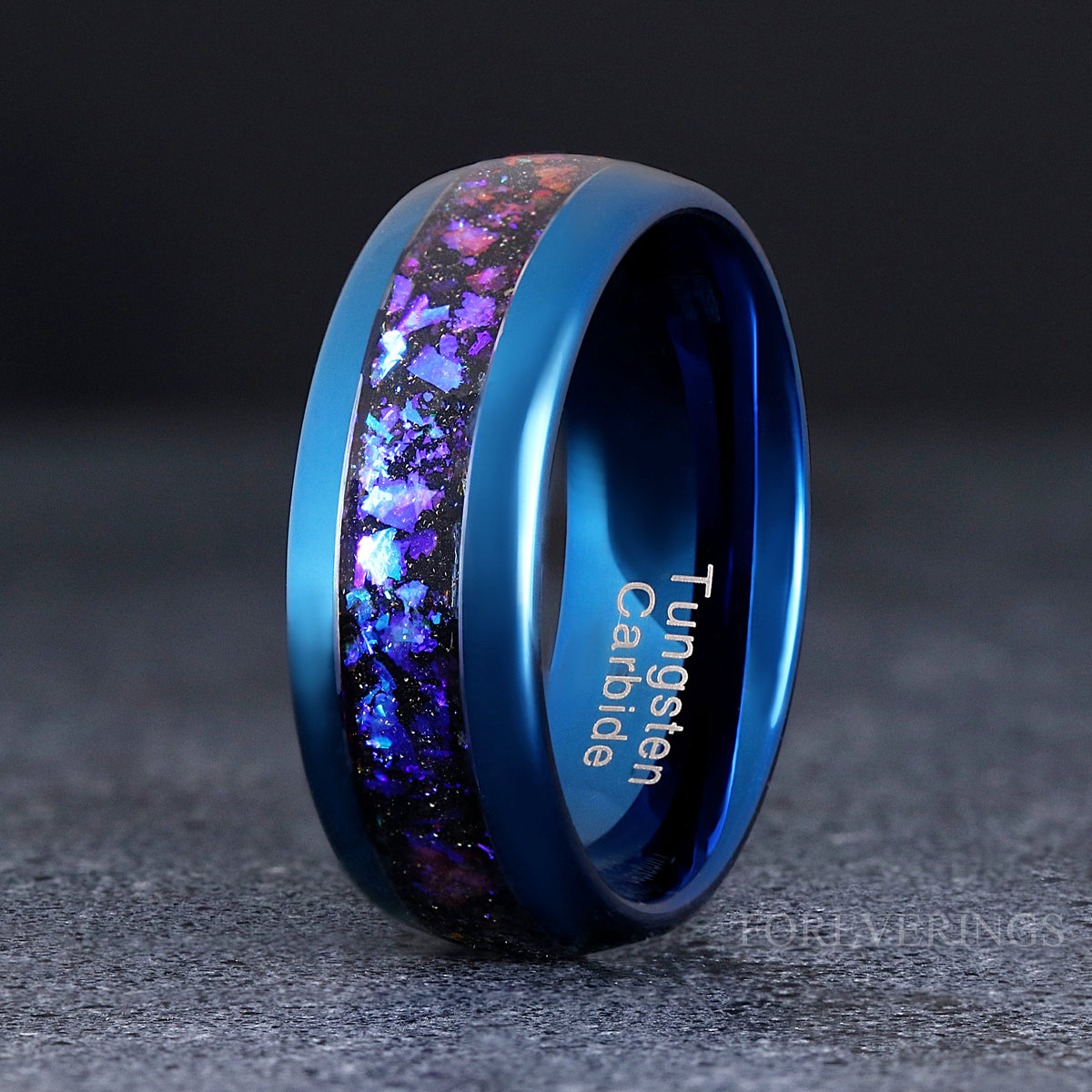 8mm blue tungsten band with purple and blue nebula sandstone inlay, angled to show the interior