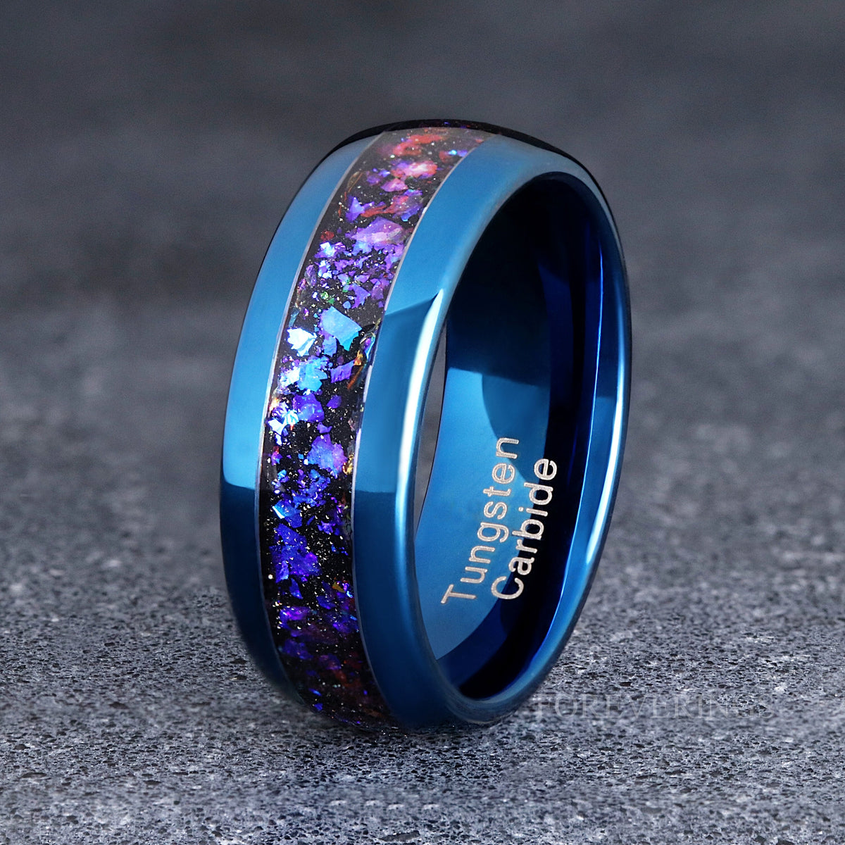 Men's blue tungsten nebula band standing on edge, closer crop of the inlay and dome