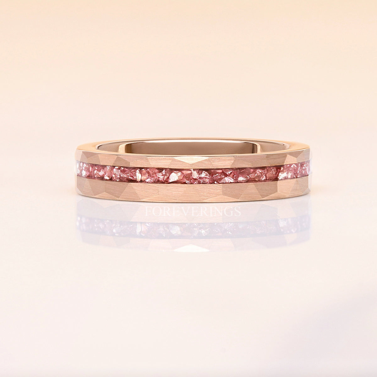 4mm hammered rose gold tungsten band with crushed morganite inlay shown straight on, reflection below