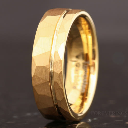 Men's 7mm hammered gold tungsten wedding band, angled to show the polished interior