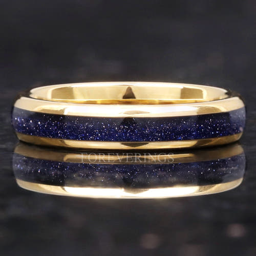 4mm gold tungsten ring with Great Rift blue sandstone inlay, lying flat with reflection