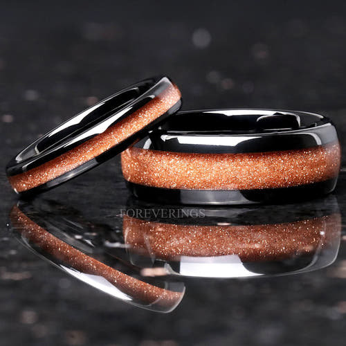 Matching black tungsten couples ring set with Carina nebula red sandstone inlay, 8mm and 4mm