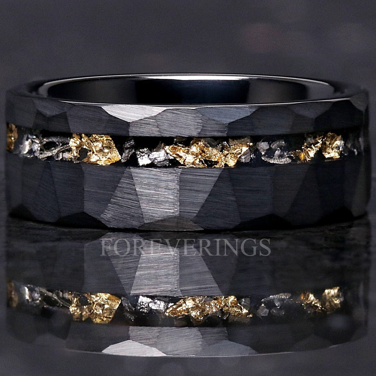 Men's 8mm hammered black tungsten wedding band with meteorite and gold leaf inlay, matte finish