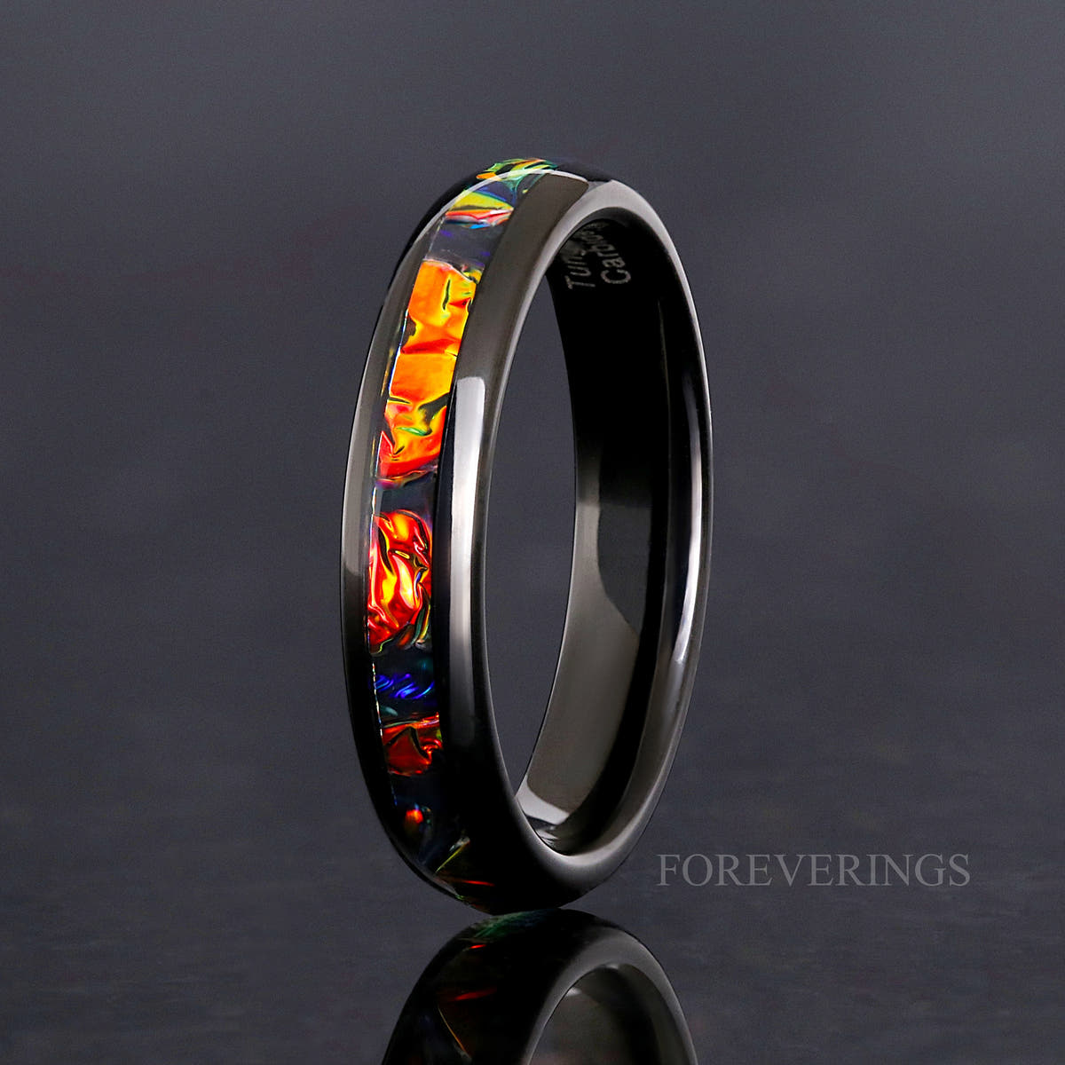 Women's 4mm black tungsten ring with dichrolam inlay, standing upright
