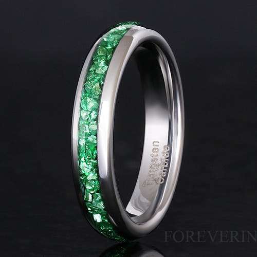 4mm silver tungsten wedding band with green emerald stone inlay, angled view