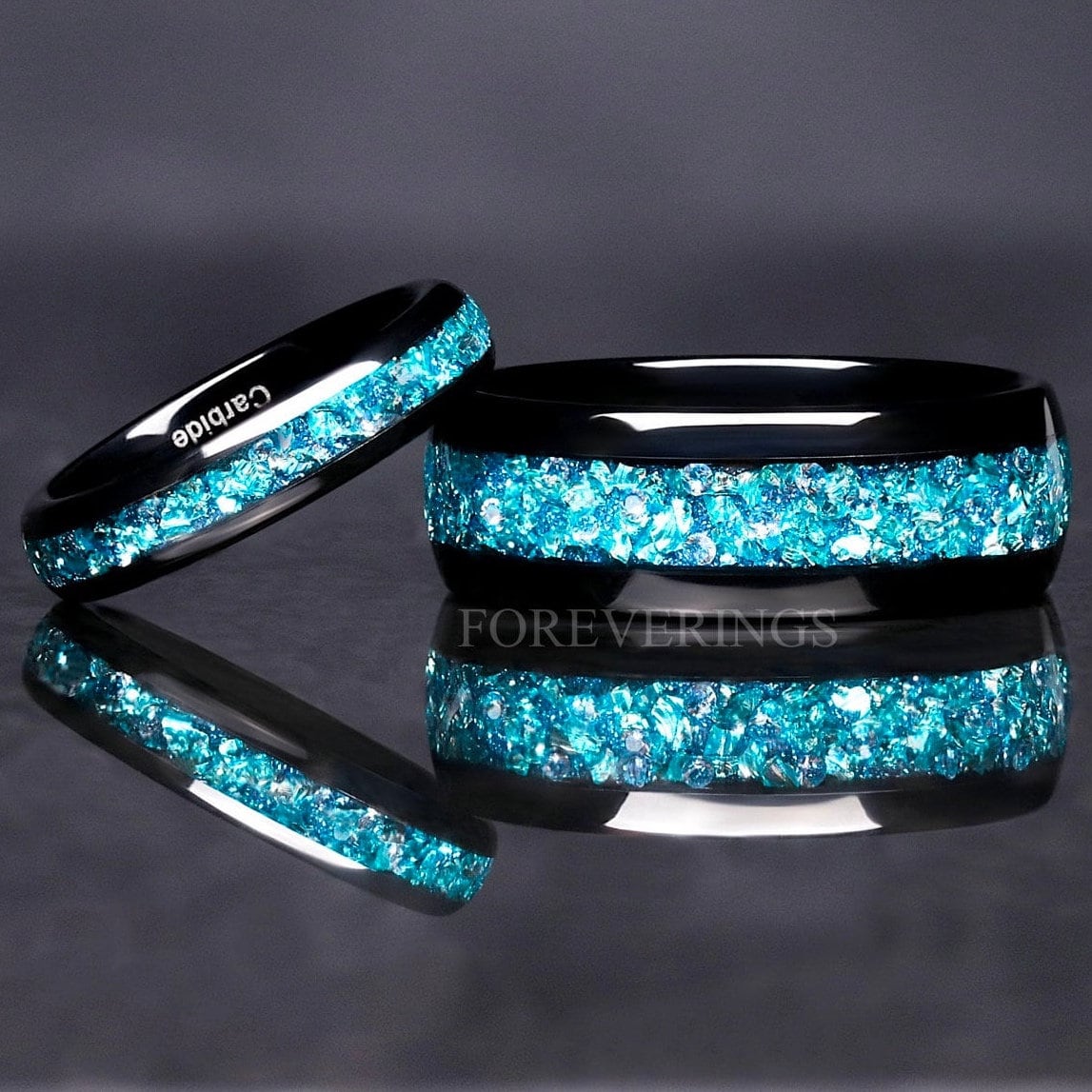 Matching black tungsten couples ring set with crushed aquamarine inlay, 8mm and 4mm