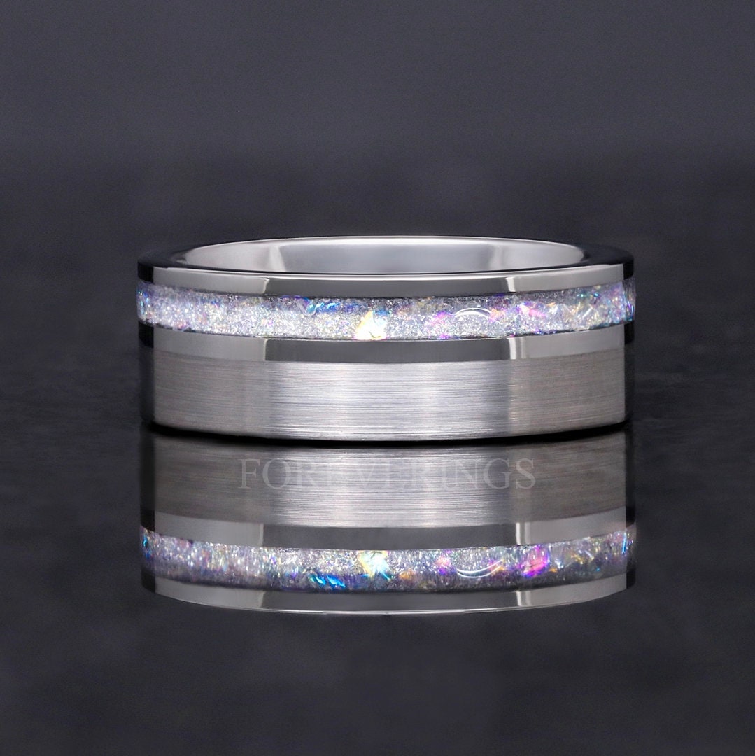 8mm silver moonstone ring shown straight on, inlay running along one edge
