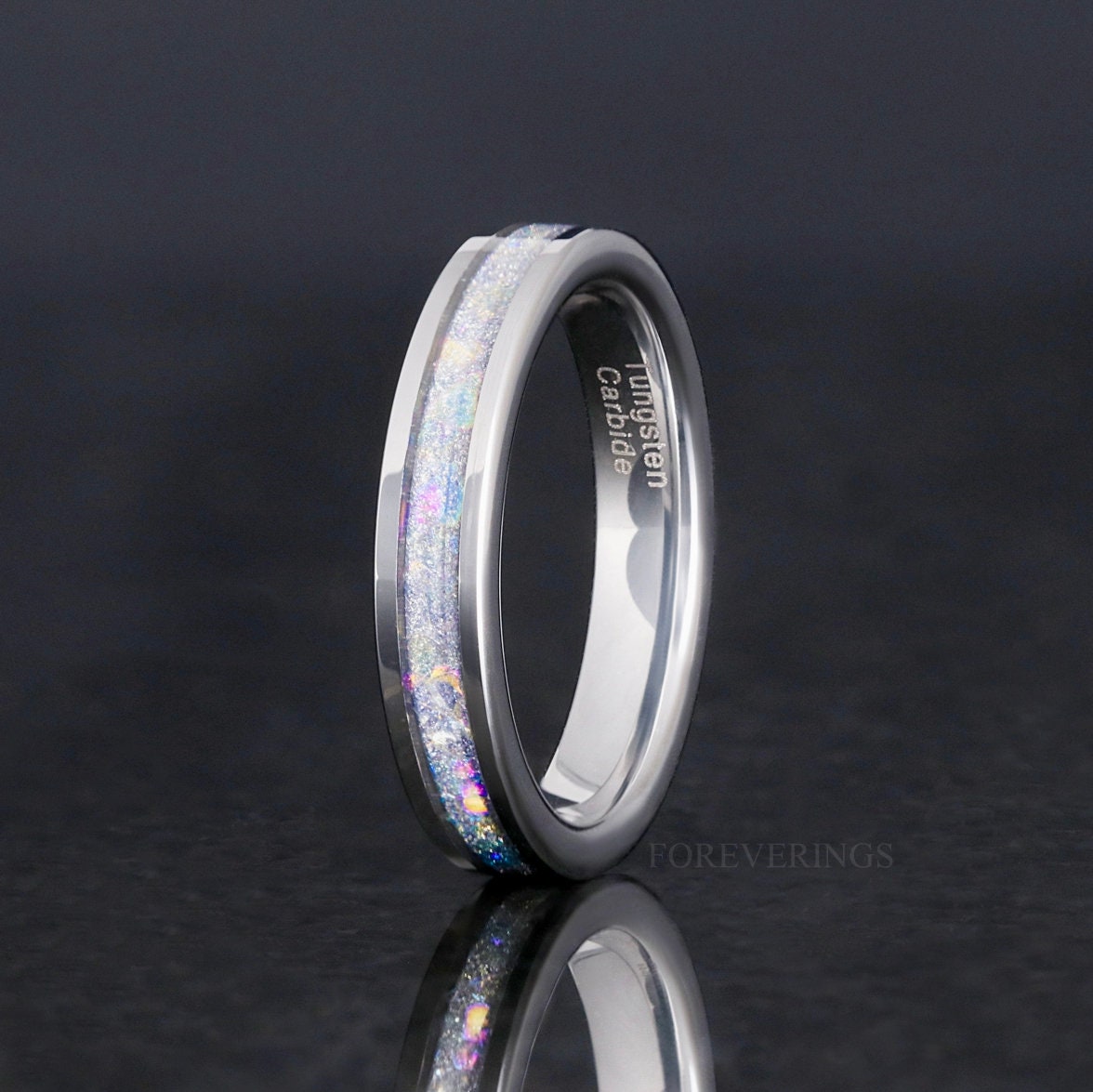 Women's 4mm silver tungsten ring with crushed moonstone inlay, standing upright