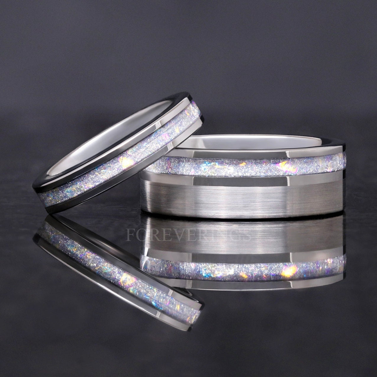 8mm moonstone ring with a thinner moonstone ring leaning on it