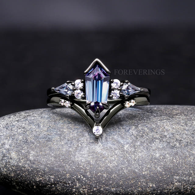 Women's black sterling silver alexandrite engagement ring set with kite side stones, front view