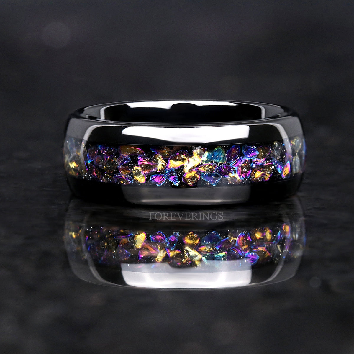 Men's 8mm black tungsten band with galaxy moonstone inlay, shown straight on