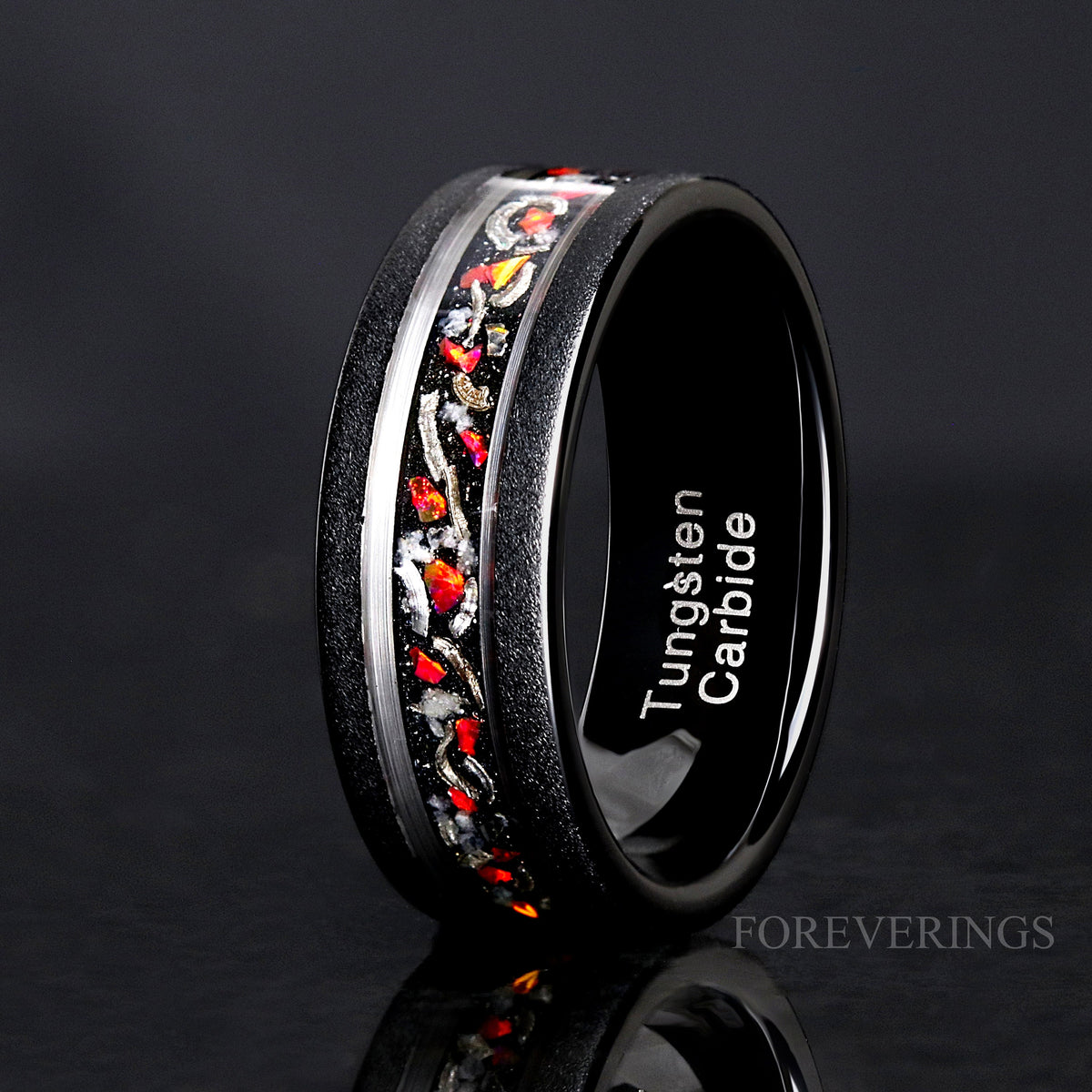 8mm black tungsten band with crushed red fire opal and meteorite inlay, angled to show the interior