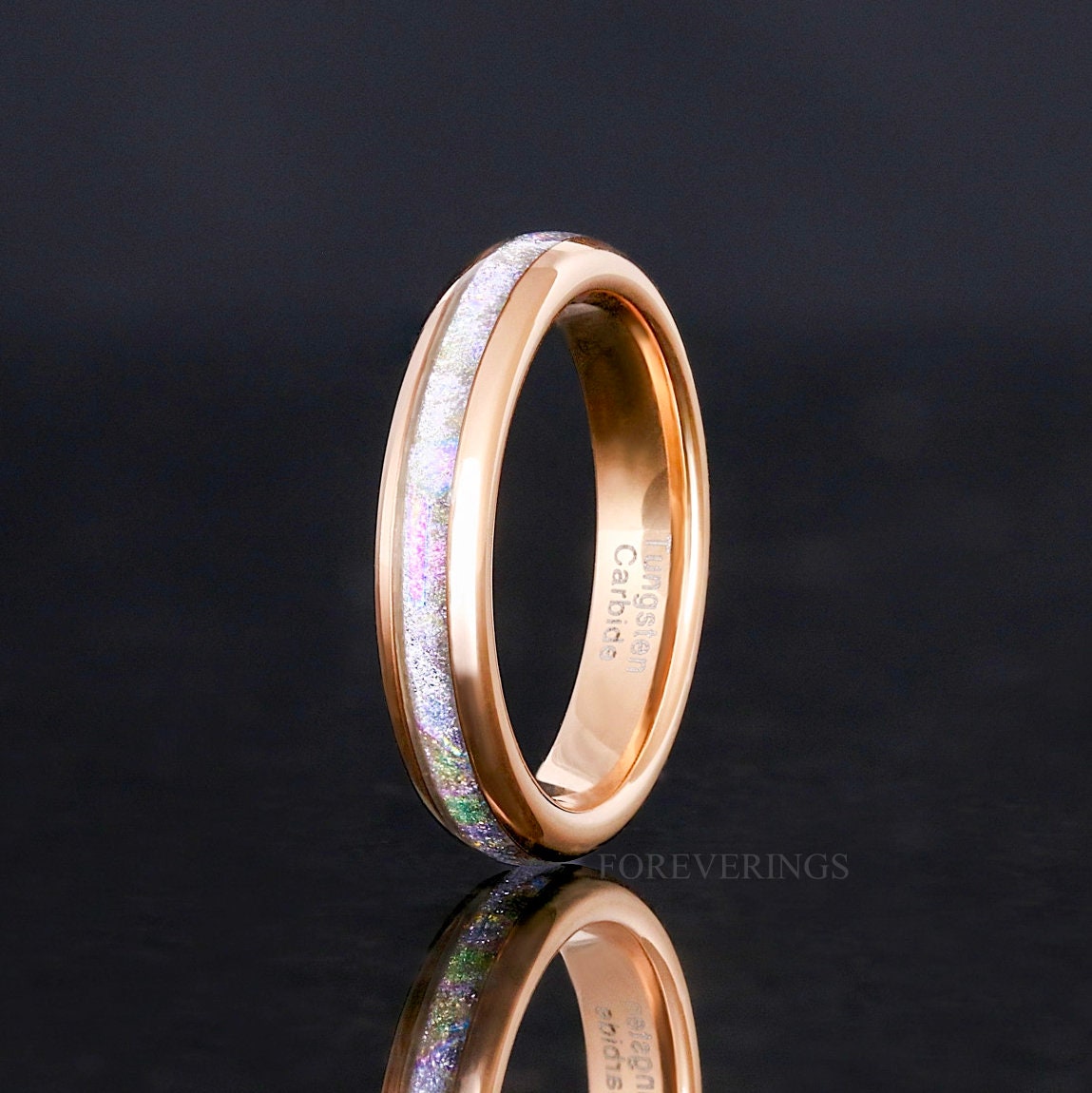 4mm rose gold tungsten moonstone ring standing on edge, angled to show the interior