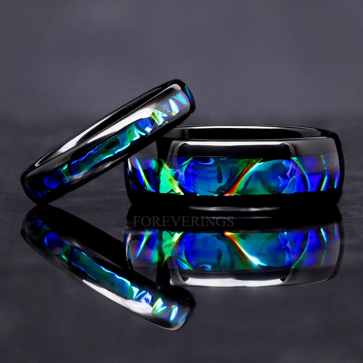 Matching black tungsten couples ring set with iridescent blue-green dichrolam inlay, 8mm and 4mm