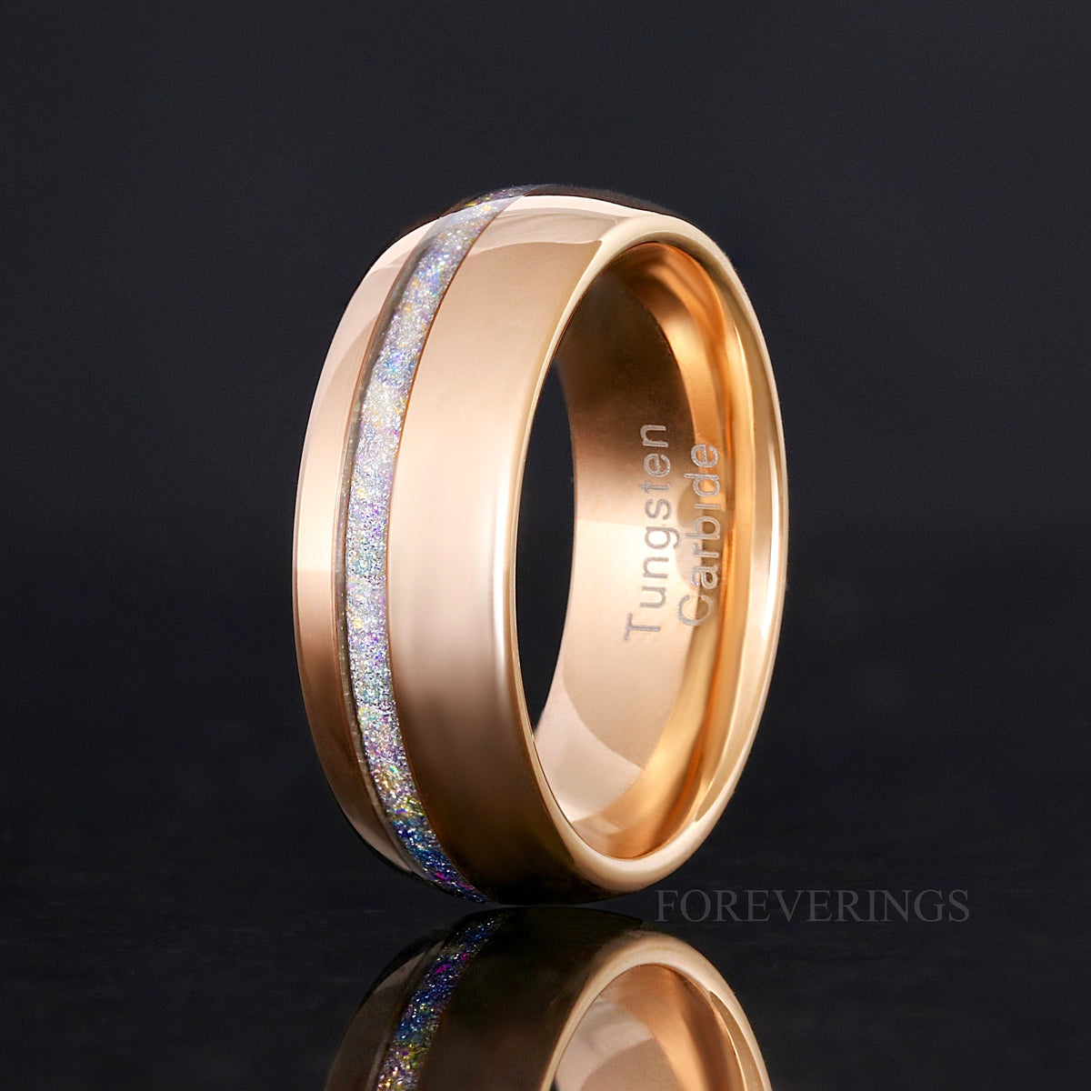 Men's 8mm rose gold tungsten ring with crushed moonstone inlay, standing upright