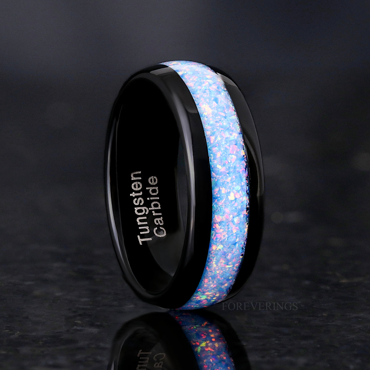 Men's 8mm black tungsten ring with rainbow fire opal inlay, polished dome, standing upright