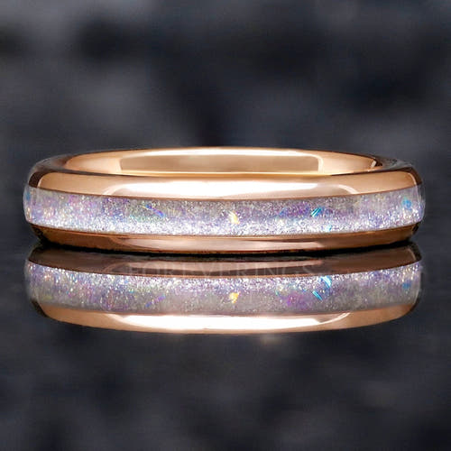 4mm rose gold tungsten wedding ring with moonstone inlay, shown straight on with a reflection