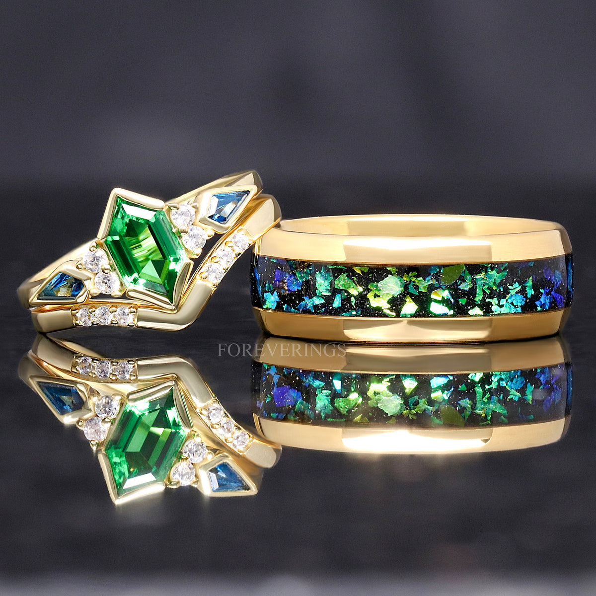 Matching gold couples ring set with a green tsavorite engagement ring and 8mm Rosette nebula tungsten band