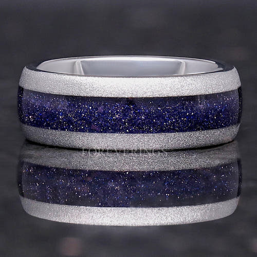 Men's 8mm sandblasted silver tungsten band with Great Rift blue sandstone inlay, front view