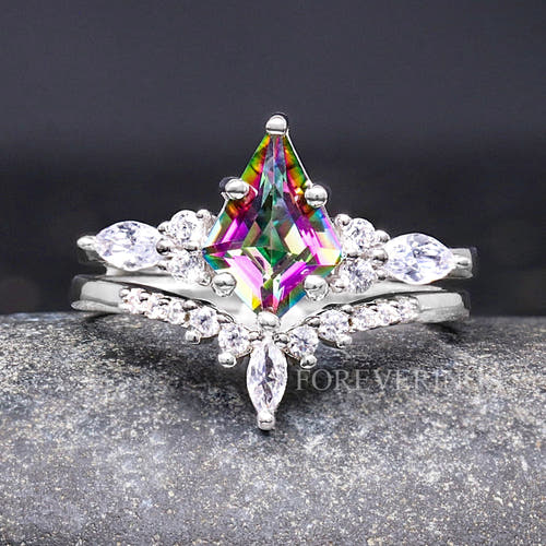 Women's sterling silver kite-shaped mystic topaz bridal set with a chevron band, shown straight on