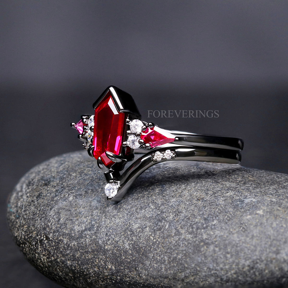 Ruby bridal set in black sterling silver, angled side view of the two stacked rings