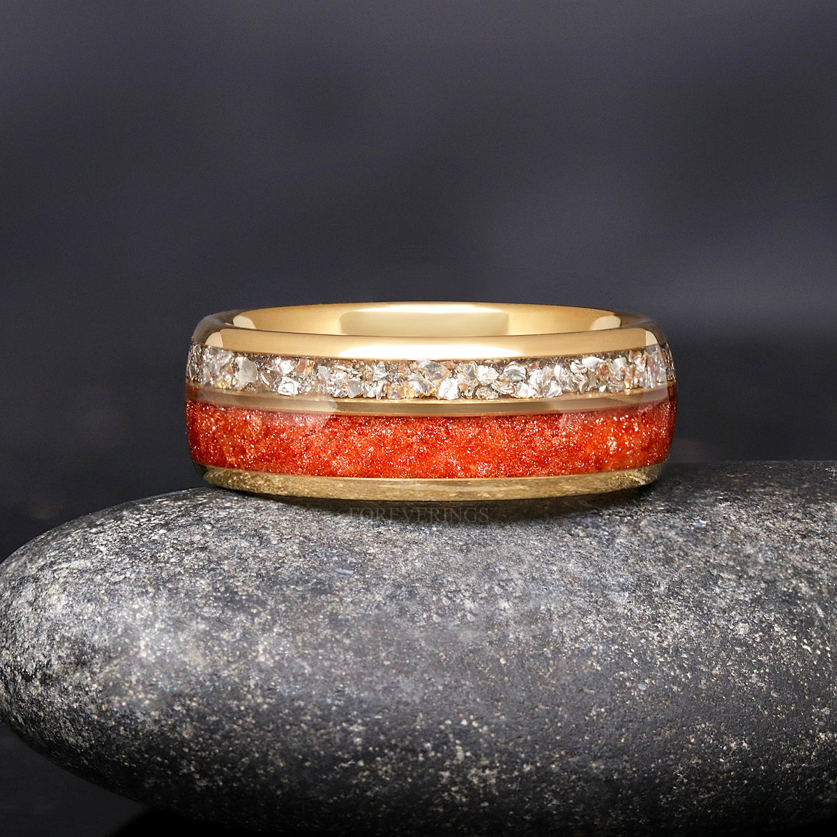 Men's 8mm gold tungsten band with crushed red sandstone and crushed diamond inlay, seen straight on