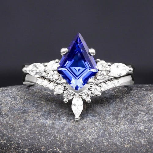 Women's sterling silver kite-cut sapphire bridal set with a chevron band, shown straight on
