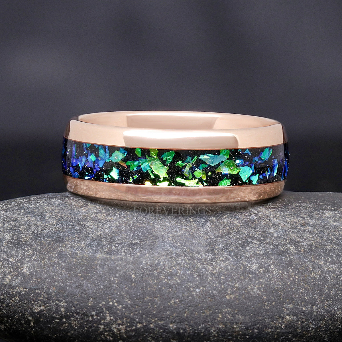 Men's 8mm rose gold tungsten band with green and blue nebula inlay, front view