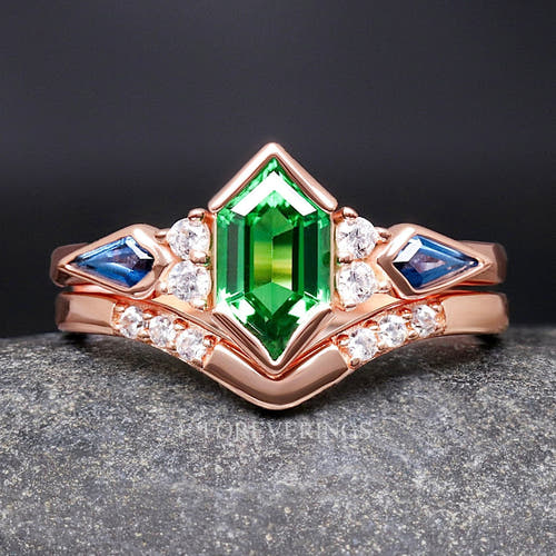 Rose gold sterling silver bridal set with an elongated hexagon tsavorite, shown straight on