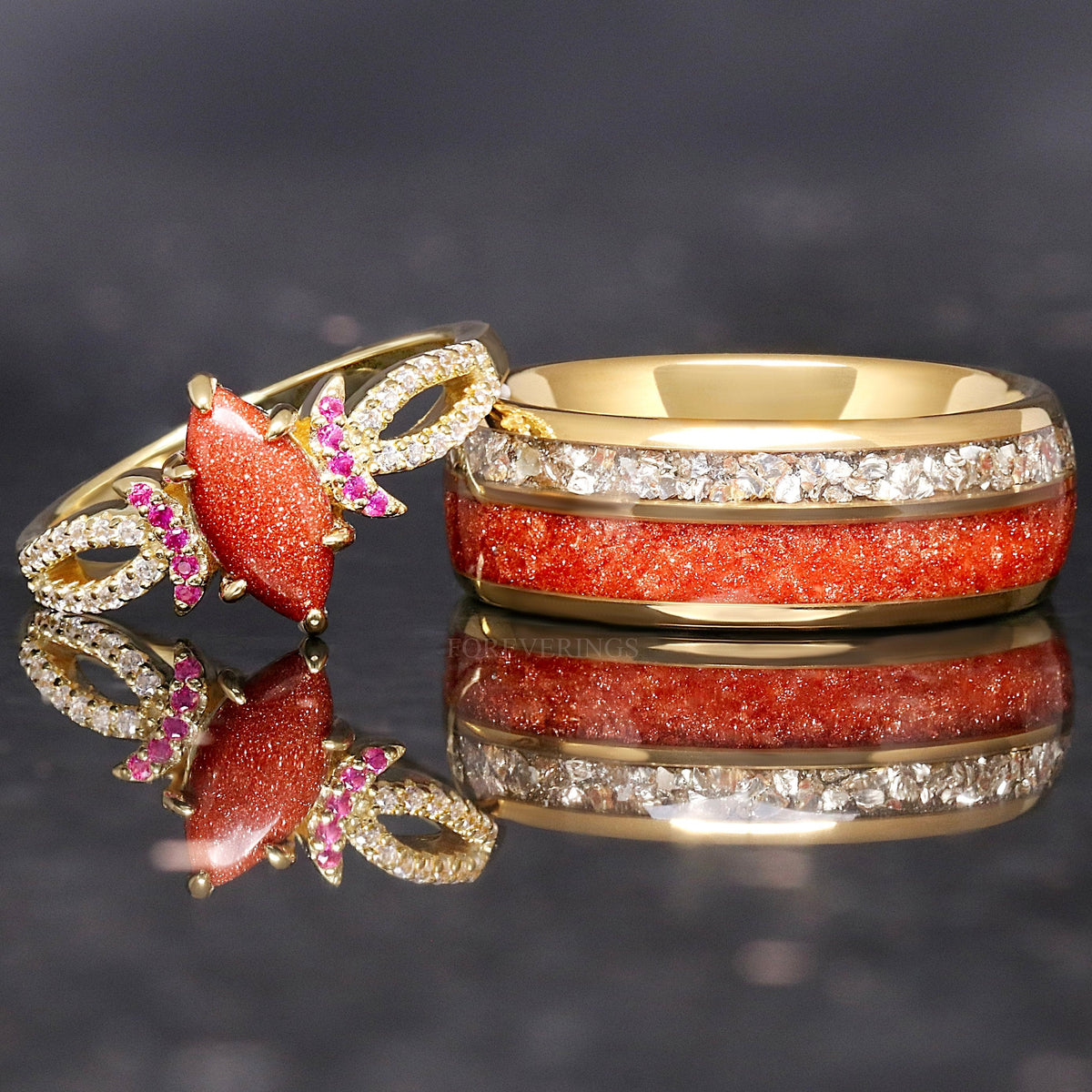 Matching gold couples ring set with a marquise red sandstone ring and 8mm red sandstone and crushed diamond band