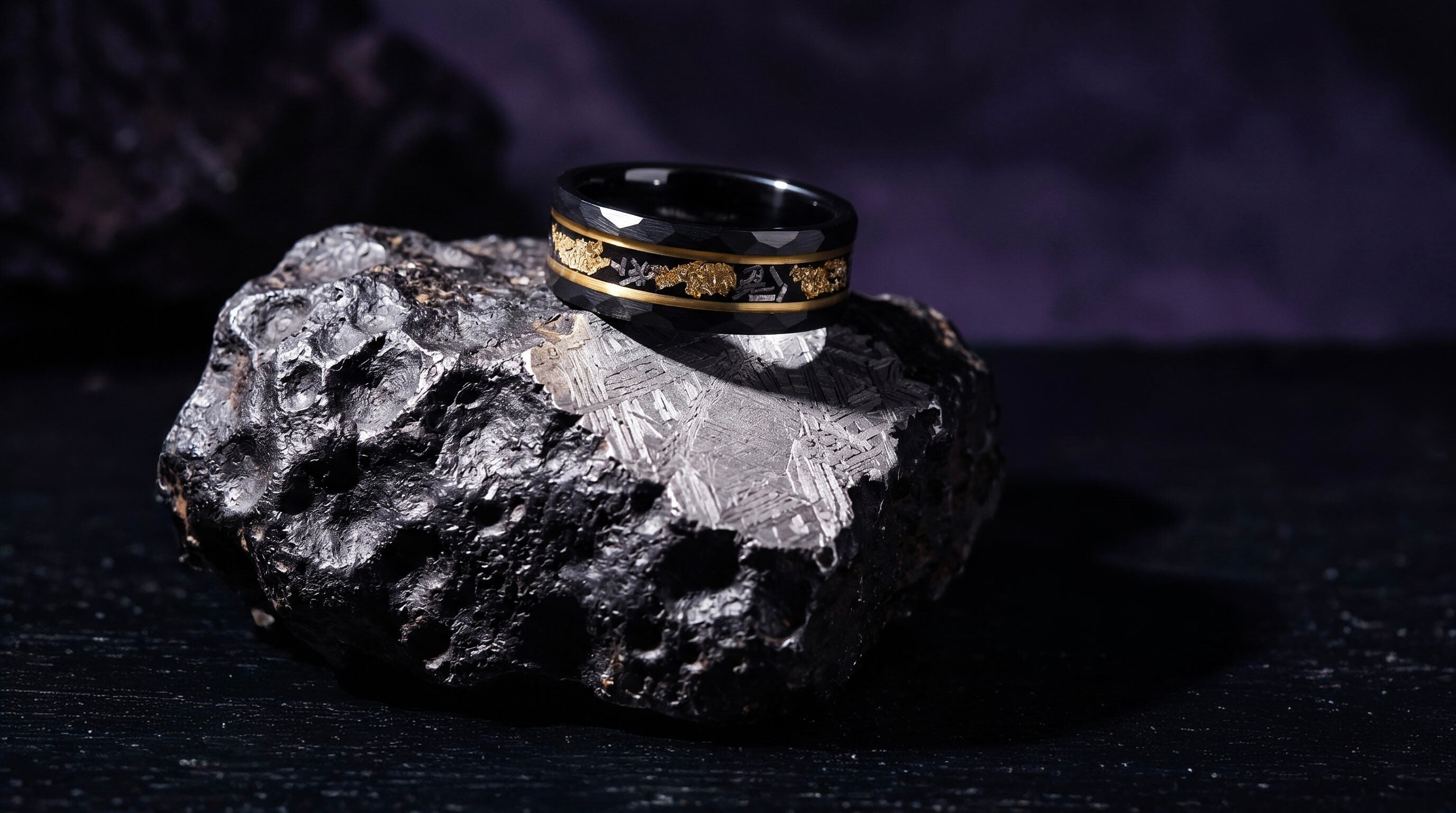 Men's meteorite wedding band with gold inlay on raw iron meteorite specimen
