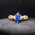 Lapis lazuli engagement ring in gold sterling silver shown straight on, with its twisted band