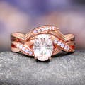 Couples engagement and wedding bands with white sapphire gemstone