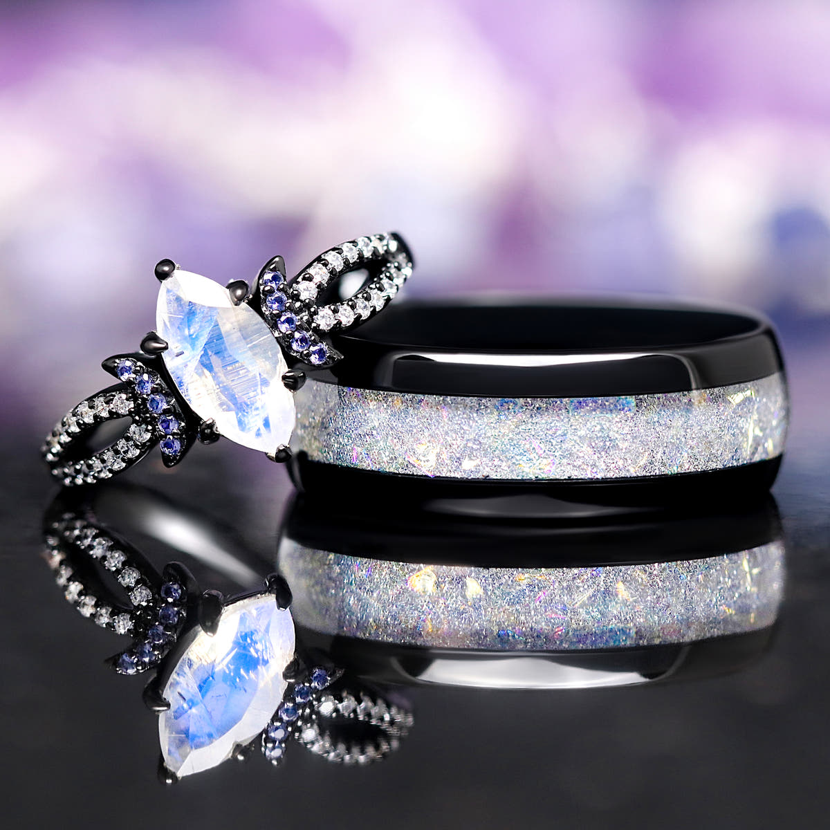 Matching black couples ring set: marquise moonstone ring and 8mm tungsten band with moonstone inlay