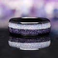 Men's 8mm black tungsten ring with moonstone and glow-in-the-dark inlay, shown straight on