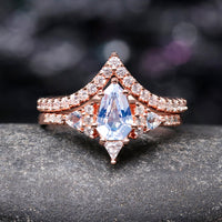 Rose gold aquamarine engagement and promise rings for couples