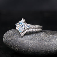 Aquamarine engagement ring and wedding band set for couples
