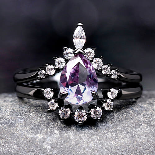 Women's black sterling silver pear-cut alexandrite bridal set with crown band, close front view