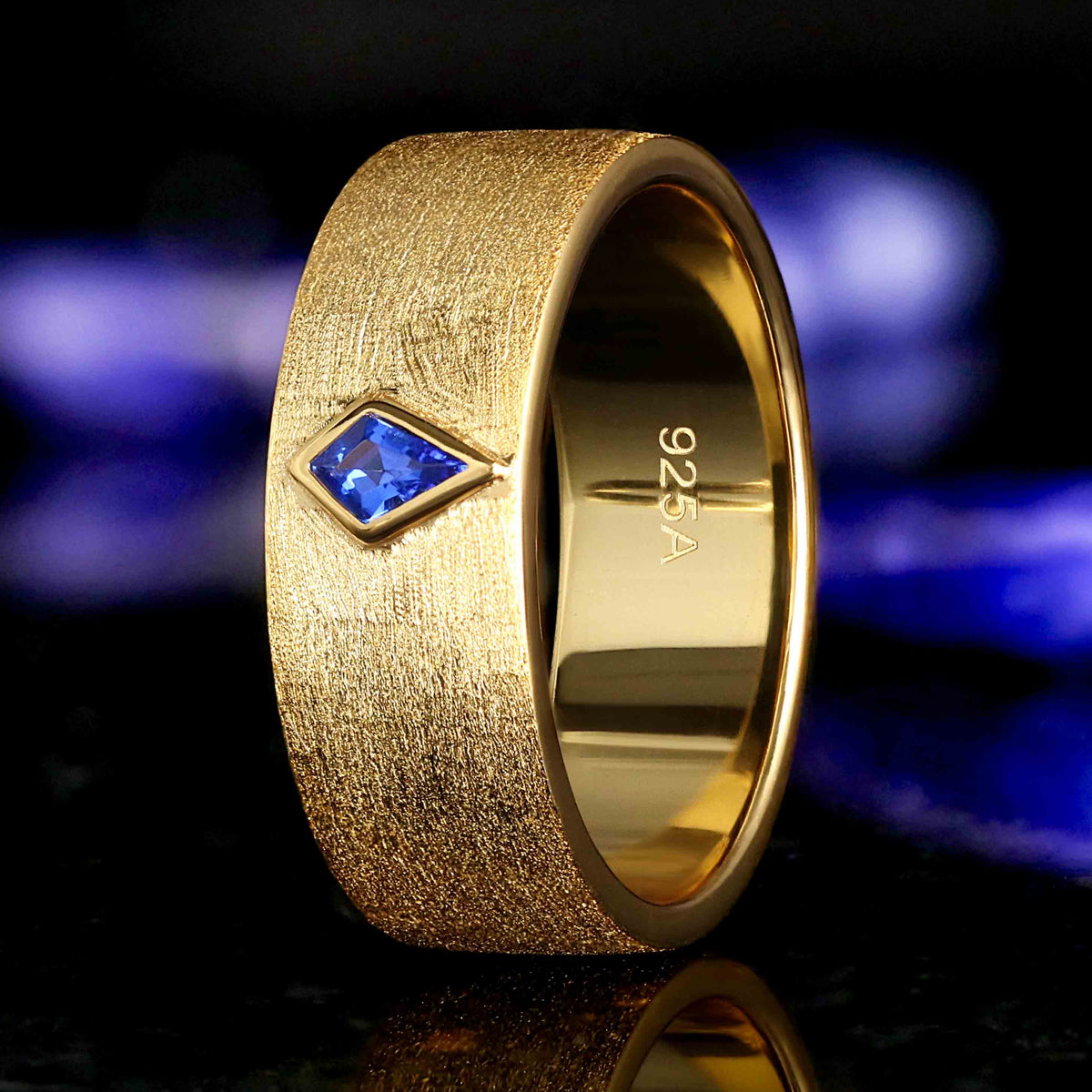 Kite cut sapphire men’s gold ring
