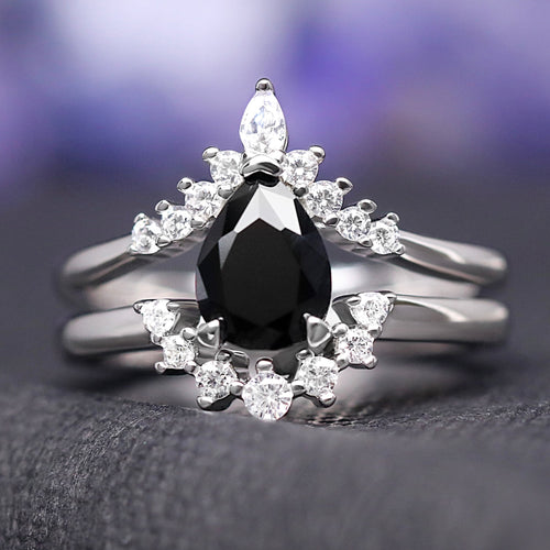 Sterling silver black onyx bridal set with a pear-cut center stone, shown straight on