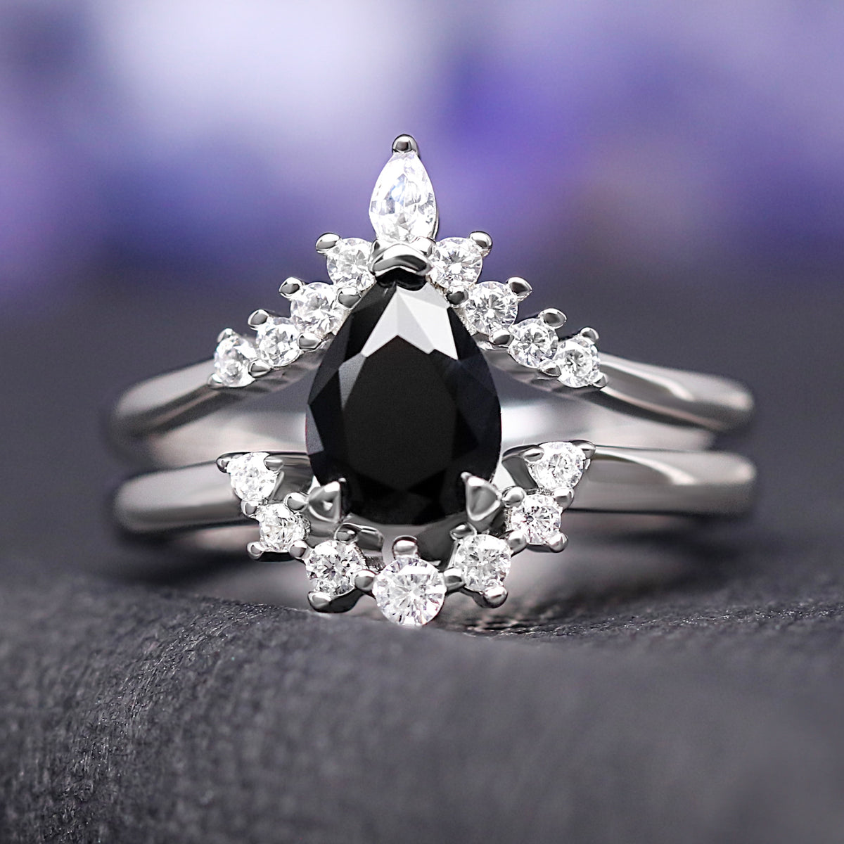 Matching black onyx and lava rock wedding bands for him and her