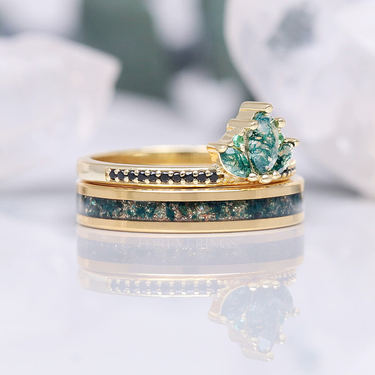 Side view of the gold moss agate crown ring stacked on the inlay band